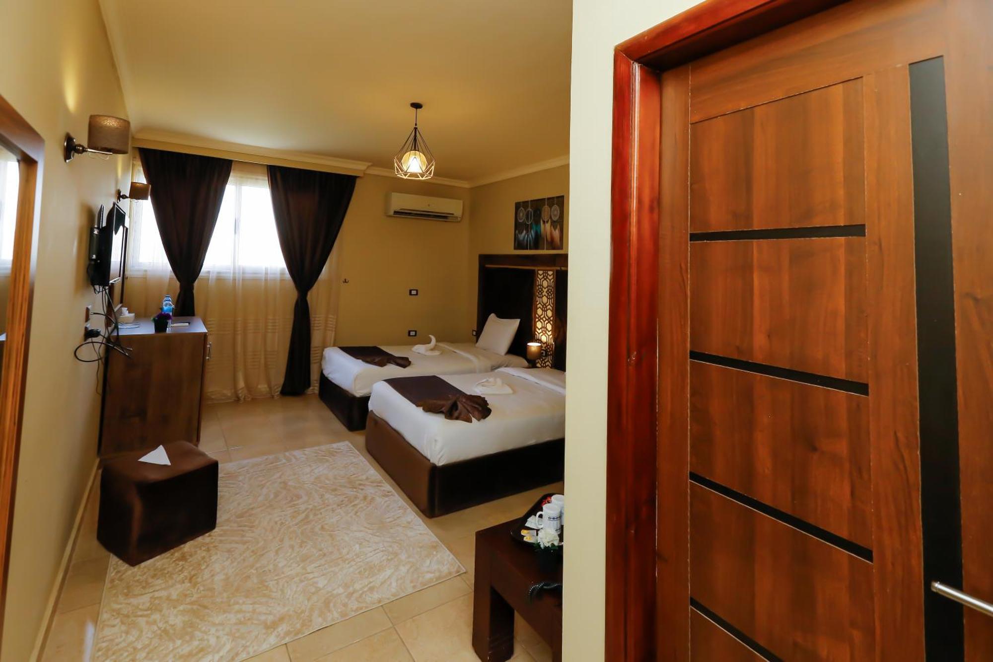 Master Pyramids Hotel Al Kawm al Akhdar Екстериор снимка